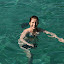 Lynette acclimatising to the waters...