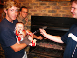 Matimu and Wessel at Matimu's first braai. Matimu's holding the tongs! Transition to Madagascar - 110.jpg