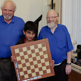 Arjan Bolina (best junior) flanked by the arbiters Peter Purland & David Welch