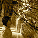 Bangkok - Light on the Woman Praying to Buddha