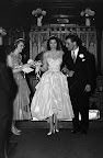 This is a photo of my grandmother in her wedding dress in 1952. I wanted to find a dress which mimicked this style, and I especially loved the idea of tea-length because you can show off your shoes.