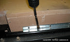 Attach to seat frame with short self-tapping sheet metal screws.