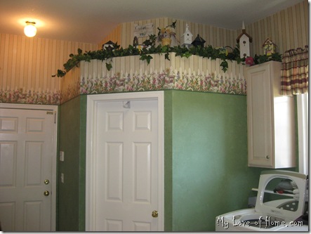 striped wallpaper, bird houses, white woodwork, green walls