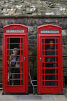 Mom and dad in telephone booths
