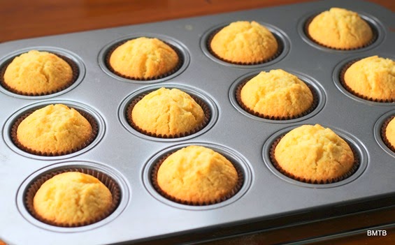 Orange Cupcakes by Baking Makes Things Better - waiting to be iced