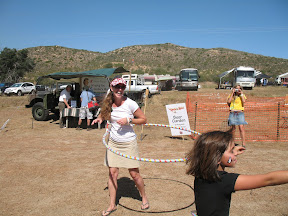 Mary gives the hula-hoop a try.