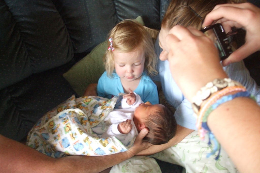 [kaylee%2520holding%2520logan%2520first%2520time%2520aug%252009%255B7%255D.jpg]