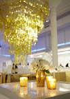 Matthew Robbins used ribbed gold containers for his flowers to go with the metallic theme.