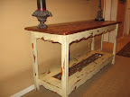 Wooden and iron sofa table for $15. Very shabby chic.