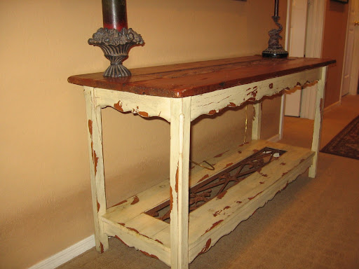 Wooden and iron sofa table for $15. Very shabby chic.