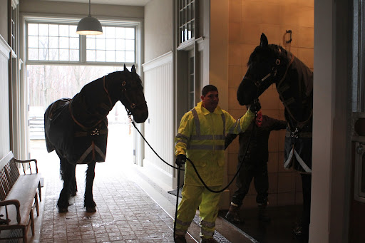 Roger leads Sasa out of the shower and Dolma moves Rutger in for his mud removal.