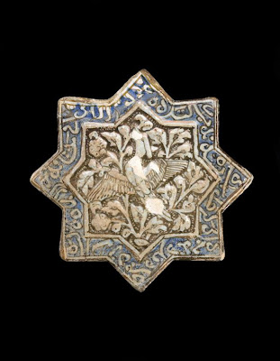 Tile | Origin:  Sultanabad,  Iran | Period: 14th century  Il-Khanid period | Details:  Not Available | Type: Stone-paste painted under clear glaze | Size: H: 20.7  W: 20.8  cm | Museum Code: F1973.15 | Photograph and description taken from Freer and the Sackler (Smithsonian) Museums.