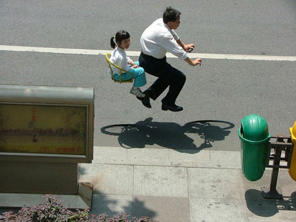 Chinese bicycle commuters - by Zhao Huasen