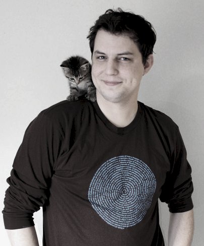 Rescued kitty Suki perched on the shoulder of her adoptive papa! Rescued kitty Suki perched on the shoulder of her adoptive papa!