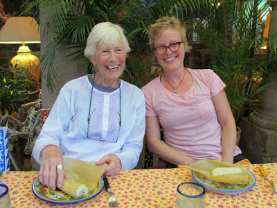 Joyce and Lauren with tamales at the end of the day