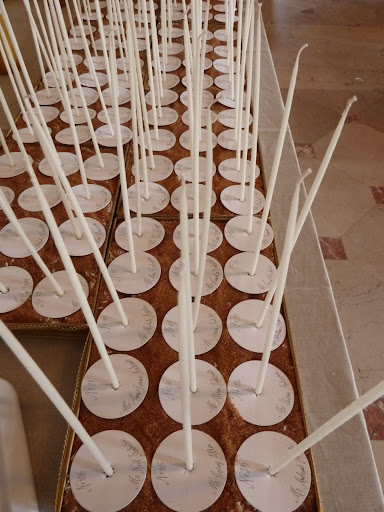 Tapered candles from Creative Candles were used for escort cards. They received 