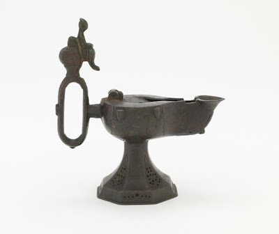 Lamp | Origin:  Iran | Period: 12th century or later | Details:  Not Available | Type: Bronze | Size: H: 13.8  W: 13.1  cm | Museum Code: F1908.54 | Photograph and description taken from Freer and the Sackler (Smithsonian) Museums.