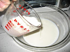 Combine heavy cream with whole milk in a medium-sized bowl.