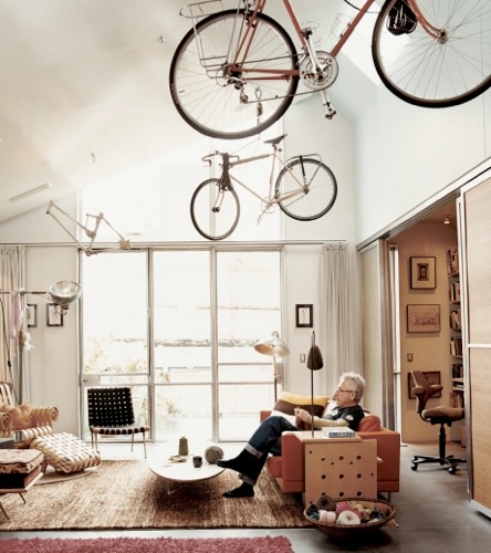 This photo was taken in the home of designer David Baker. He is making striking use of his high ceilings. (dwell.com)
