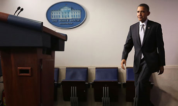 U.S. President Barack Obama approaches the podium. President Obama listed climate change among the top three priorities of his second term. Alex Wong / Getty Images