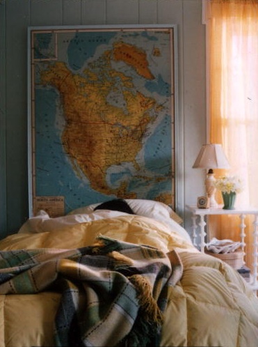 This headboard was made from an old schoolhouse map. (Martha Stewart Living, August 2002)