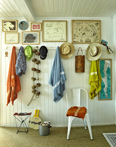 This wall of hooks in Eric Hughes and Nathan Turner's Malibu home is both practical and decorative, and wards off clutter. This wall of hooks in Eric Hughes and Nathan Turner's Malibu home is both practical and decorative, and wards off clutter.