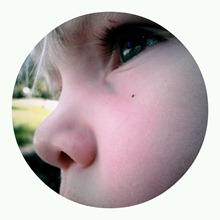 a single piece of glitter under her eye
