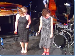 June Hayes and Maria O'Flaherty focussing on Jim Langabeer's stunning sax playing (off shot to the right).