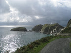 Coastline: lighthouse, road & jetty