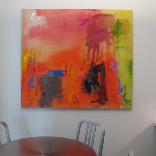 Aaron Stewart, VP of Design, has this painting of Booth's hung in his office. It gives the all-white office a good punch of color.