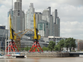 The old wharf cranes were painted and left in place to give Puerto Madero an old world feel.