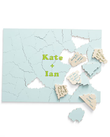 Instead of an album-style tome, have a custom puzzle made with your names and/or wedding date. Place the pieces in a glass bowl at your reception, along with a sign asking friends to autograph the unfinished backs. When the party is over, put them together and read the good wishes. Instead of an album-style tome, have a custom puzzle made with your names and/or wedding date. Place the pieces in a glass bowl at your reception, along with a sign asking friends to autograph the unfinished backs. When the party is over, put them together and read the good wishes.