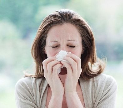 [woman-rubbing-nose-with-hanky3.jpg]