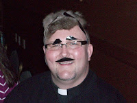 Father Troy Richmond getting in on the fun with Uncle Bruster at St. James