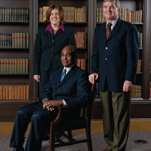 Andrea Peterson, ’96, Charles Mitchell, ’65, and Mark Emmert, ’75