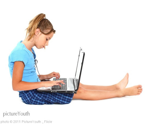 'Innocent girl on laptop' photo (c) 2011, PictureYouth . - license: http://creativecommons.org/licenses/by/2.0/