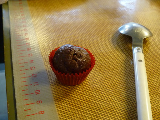 Use a spoon to scoop out the chocolate mixture, then roll and shape the truffles
