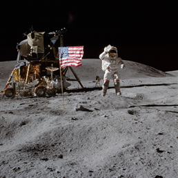 c0 John Young salutes the American flag on the lunar surface.