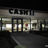 Early reports are that two male black adults waited in the back of an employee's car at Cash1. They made her go back in and open the safe. Per unconfirmed reports, the suspects only made off with change. Suspects reportedly in their 30's, and left in a grey SUV. News_120126_Robbery_121138