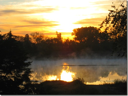 Kansas Sunrise, steam on lake, orange and gold sunrise,