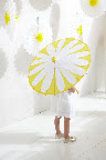 These pretty yellow parasols are such a fun way to keep guests cool and shaded. I embellished the plain yellow with some white cut-out petals to make my flower girl look as cute as a daisy. It's even a cute project for the kids to work on at the party! Get the how-to here: http://ow.ly/con2Y