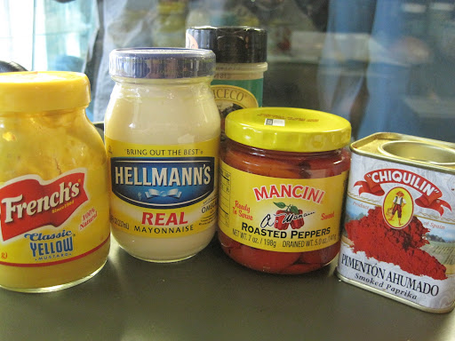 Mustard, mayo, roasted peppers, and smoked paprika - part of the line-up for pimiento cheese. Mustard, mayo, roasted peppers, and smoked paprika - part of the line-up for pimiento cheese.