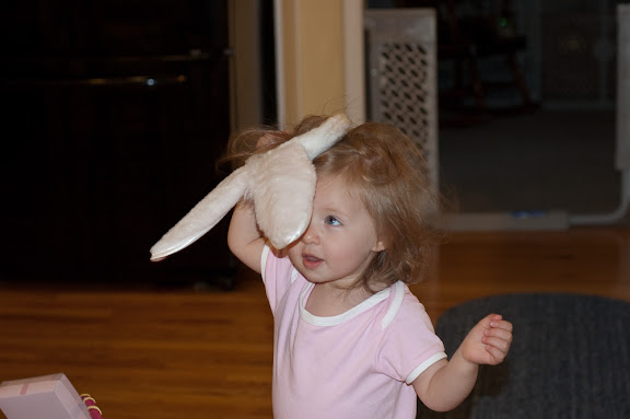 Though she doesn't keep them on for long.
