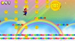 ACALME-SE! Não é a Rainbow Road, apenas o Rainbow Course para você recolher mais Coins. Se fosse assim no Mario Kart...