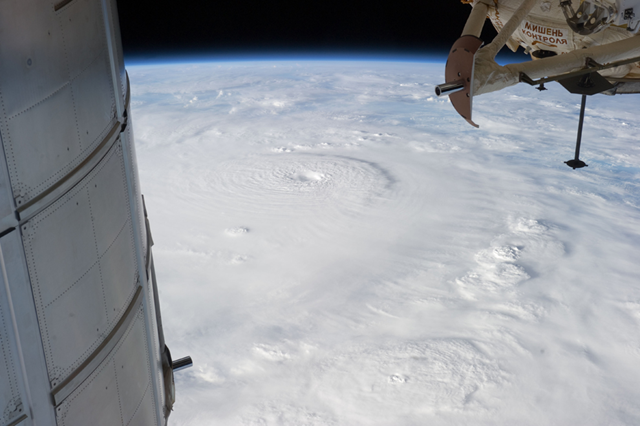 Typhoon Bopha is shown moving toward the Philippines from the International Space Station, 2 December 2012. The typhoon slammed into the Davao region of the Philippines early on 4 Decemer 2012, killing hundreds and forcing more than 50,000 to flee from inundated villages. NASA / Associated Press