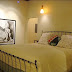 The Loft features a King Size Bed with unique light fixtures.