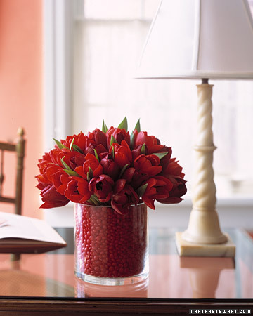Play up the sweetness of the day with candy-based arrangements.