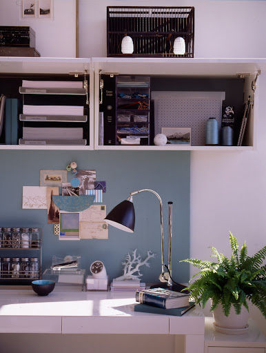 Kitchen cabinets that flip up, instead of out, make contents easy to access.