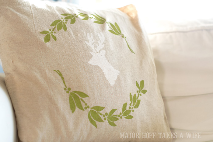 Stag Head Wreath pillow. Looking for a way to bring Creativity into your Holiday Decor? Use easy to find items like pillow covers or dish towels, along with stencils to decorate your home for the Holidays. Enjoy crafting your own decorations this Christmas! #Christmas #Holidays #crafts #HolidayIdeas Stag Head Wreath pillow. Looking for a way to bring Creativity into your Holiday Decor? Use easy to find items like pillow covers or dish towels, along with stencils to decorate your home for the Holidays. Enjoy crafting your own decorations this Christmas! #Christmas #Holidays #crafts #HolidayIdeas