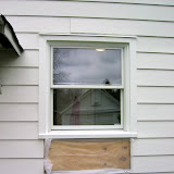 Exterior view of the new pantry window. We got one shorter than the original window, as we added counters in the pantry, and the original window came down too low. (The contractor is coming back to finish the siding).